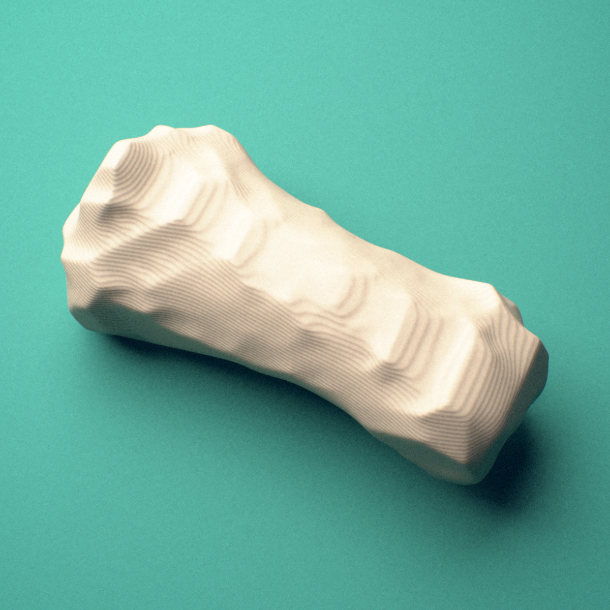 3D-printed Left index finger middle phalanx, close-up view showing the head (trochlea).