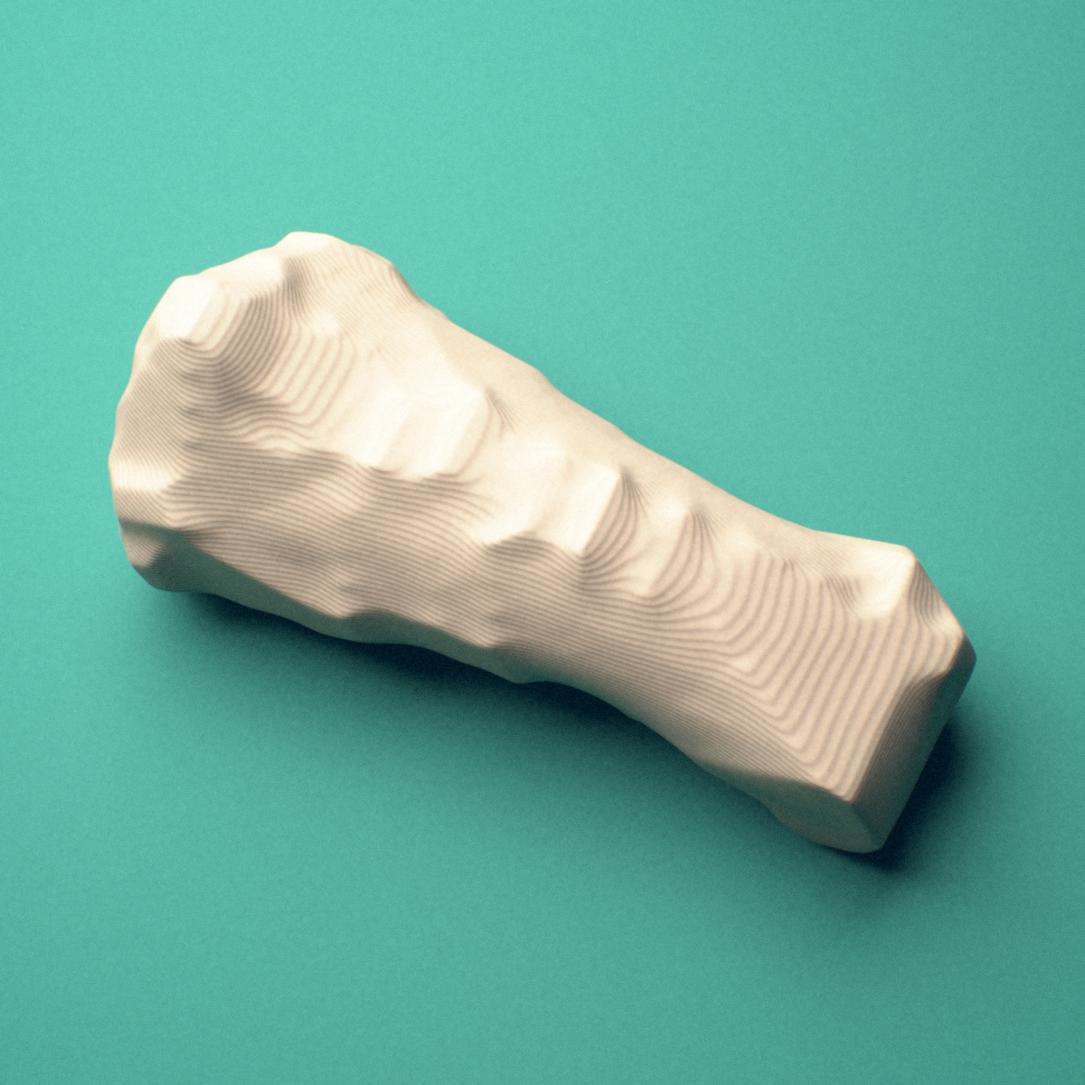 3D-printed Left middle finger middle phalanx, close-up view showing the head (trochlea).